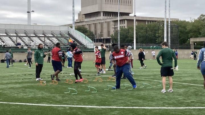Students working with Special Olympics