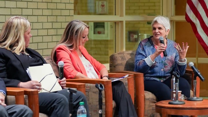 Panelists speaking at Age-Friendly University event