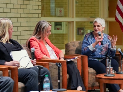 Panelists speaking at Age-Friendly University event